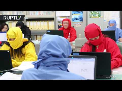 شاهد يابانيون يذهبون إلى العمل بـزي النينجا