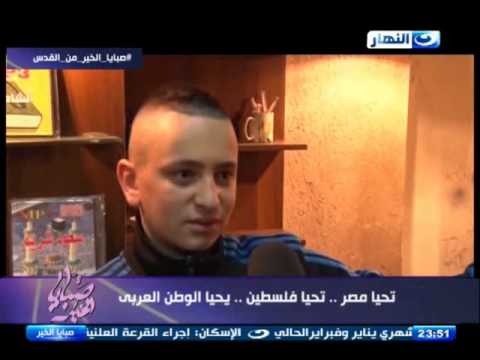 طفل فلسطيني يضطر للتعامل بالعملة الإسرائيلية