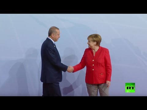شاهد أنجيلا ميركل تستقبل الرئيس التركي رجب طيب أردوغان