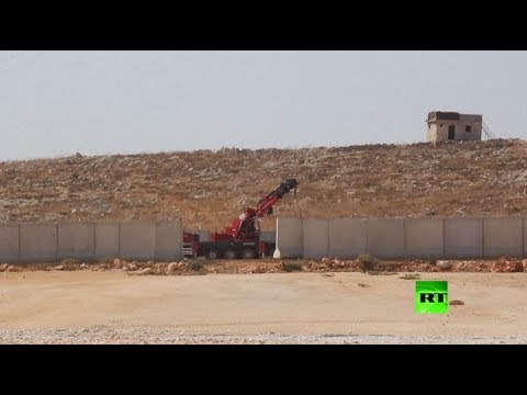 شاهد تركيا تفتح ثغرة في الجدار الأمني على الحدود السورية
