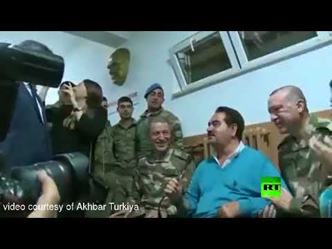 شاهد تاتليسيس يتغنّى بانتصارات الجيش التركي في حضرة أردوغان