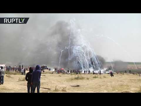 شاهد حالات اختناق بين الفلسطينيين المشاركين في مسيرات جمعة الكاوشوك