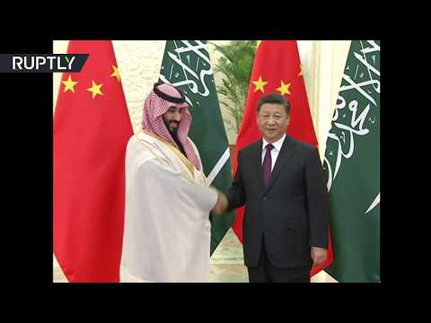 لحظة استقبال الرئيس الصيني لولي العهد السعودي