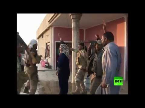 احتفال سكان العلم بعد تحريرها من داعش بالفيديو