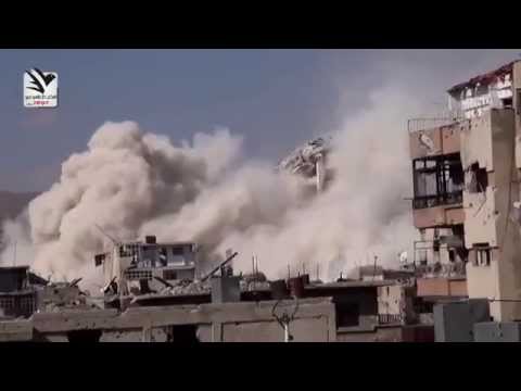 لحظة انهيار برج المعلمين في دمشق