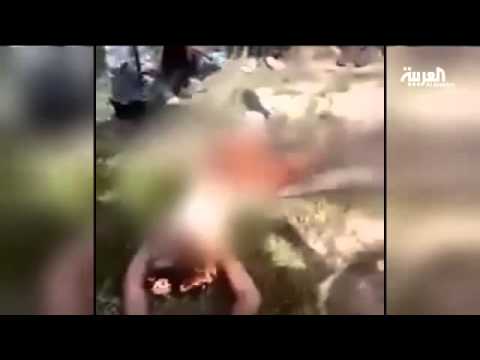 شاهد ميليشيات الحشد تحرق شاب مقاتل من داعش