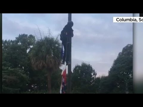شاهد لحظة إنزال ناشط لعلم الكونفدرالية في ساوث كارولينا