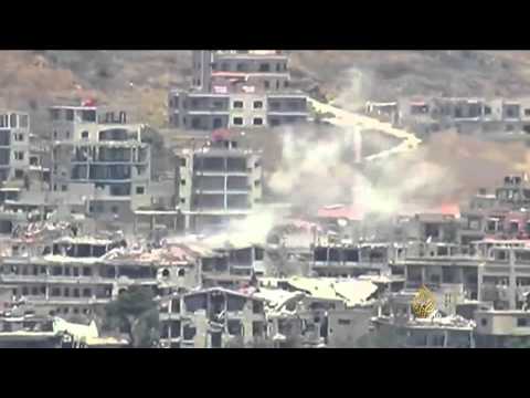 شاهد الجيش السوري يزيد استخدام البراميل المتفجرة