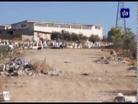 شاهد متطوعون ينفذون حملة لتنظيف المقبرة الإسلامية في مادبا الأردنية