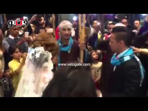 بالفيديو  وصلة رقص بلدي لـحازم إمام وعروسته خلال زفافهم