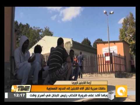 شاهد حافلات مجرية تنقل آلاف اللاجئين إلى حدود النمسا