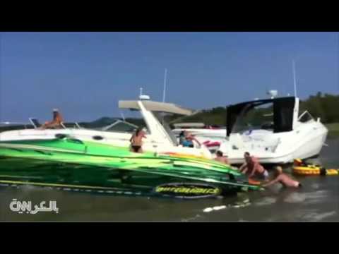 شاهد سفينة في جهاز البحرية الأمريكية تحطم قوارب وتثير الذعر