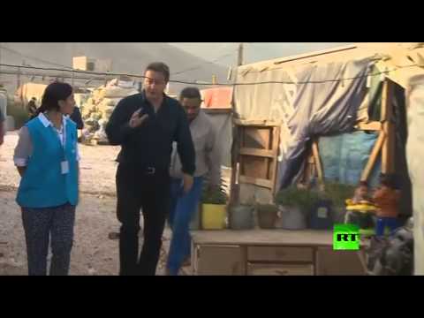 كاميرون يزور مخيمات للاجئين السوريين