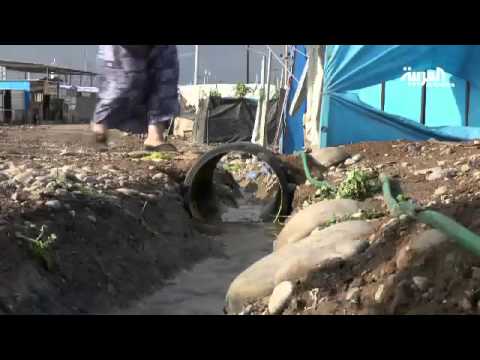 شاهد الأمطار تجتاح مخيمات لاجئين سوريين في العراق