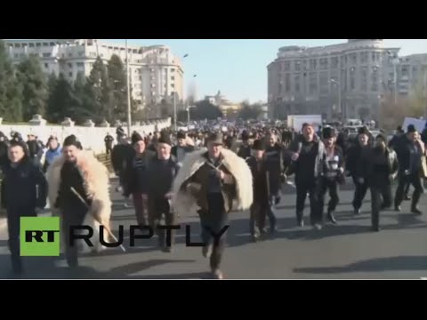 شاهدرعاة غنم رومانيون يقتحمون البرلمان