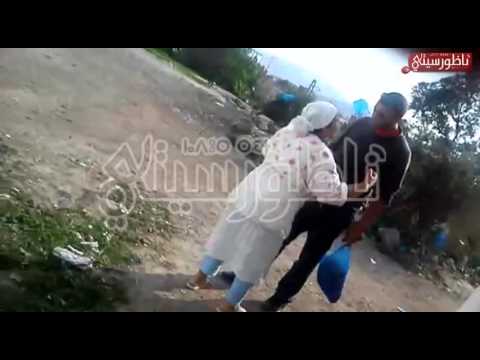 بالفيديو زوج يضرب زوجته وأسرتها بالسيف