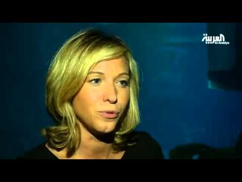 مشاركون في مسابقة علمية في باريس يمضون ليلة بين أسماك القرش