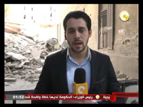 آثار انهيار عقار وجزء من مدرسة في منطقة وسط البلد في القاهرة