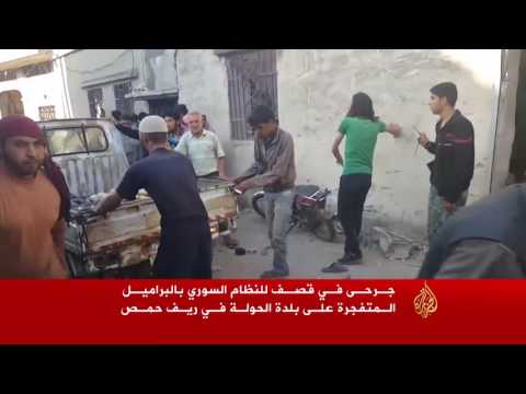 قتلى وجرحى بغارات للنظام على حمص ومعارك عنيفة في حماة