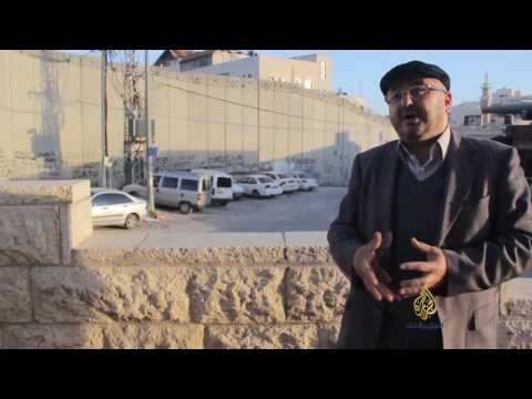 بالفيديو الجدار العازل يخنق القدس