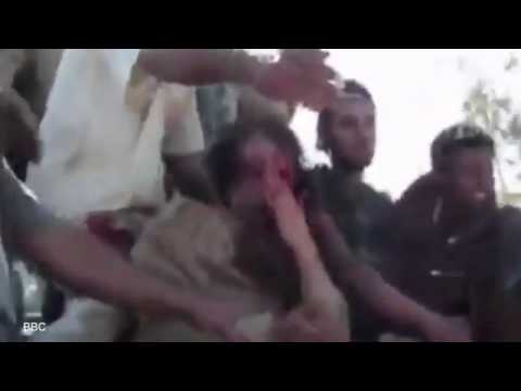 بالفيديوشاهد الكشف عن مقطع جديد للحظة مقتل معمر القدافي