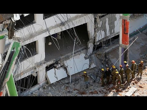 بالفيديو قتيلان و20 جريحا بانهيار مبنى في تل أبيب