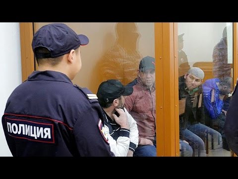 بالفيديو محاكمة 5 شيشانيين بتهمة اغتيال المعارض الروسي بوريس نيمتسوف