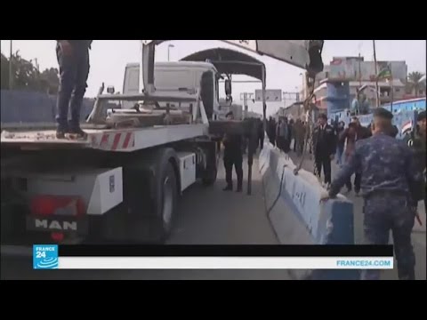 شاهد السلطات تشرع في إزالة نقاط التفتيش من العاصمة بغداد