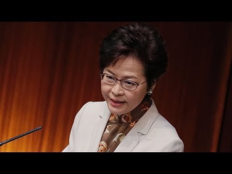 hong kong leader reject threats