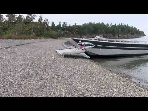 boat climbs itself up the shore