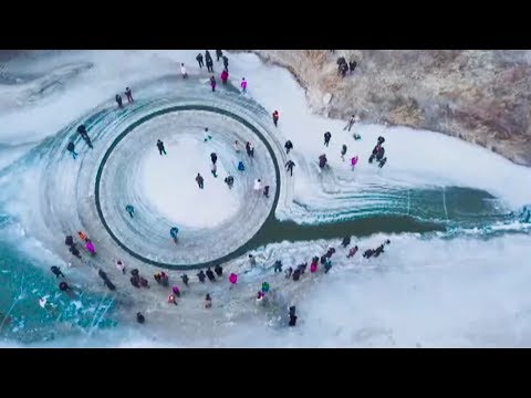 drone video shows rotating ice circle in frozen river in ne china