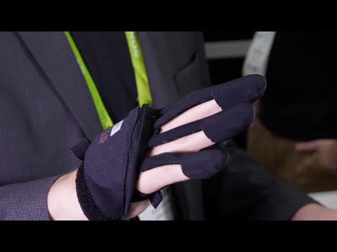how do you play guitar in virtual reality well you need a smart glove