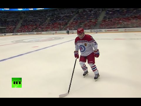 putin hits the ice for hockey match in sochi