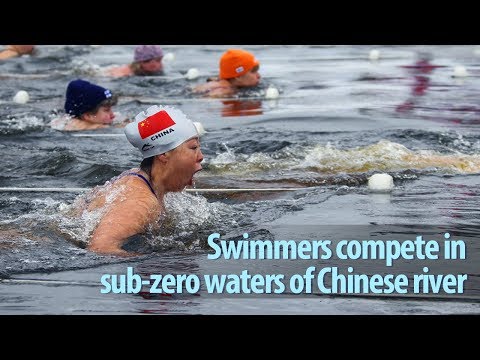 swimmers compete in subzero waters of chinese river