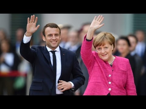 macron meets merkel on first day