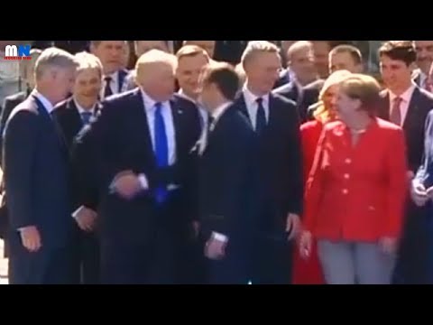epic handshake after emmanuel macron
