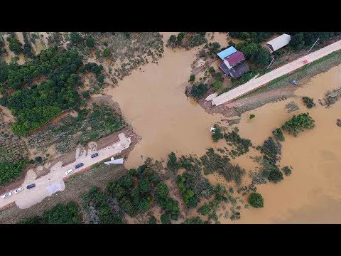 27 dead eight missing after floods hit