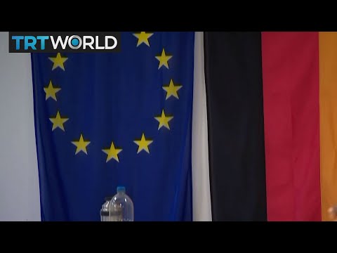 exit polls suggest victory for merkels party