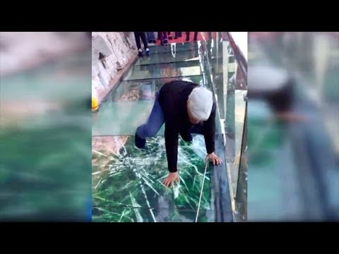 tourist terrified by new glass walkway that cracks