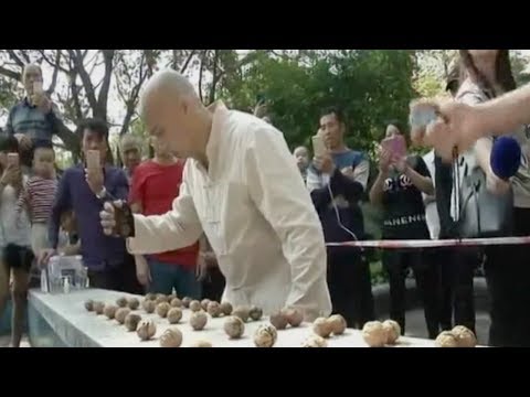 new world record for smashing walnuts with bare hands set