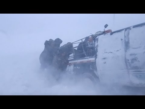 the ultimate rescue operation police trudge through snowstorm to rescue shepherds