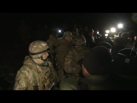 ukraines warring sides swap prisoners