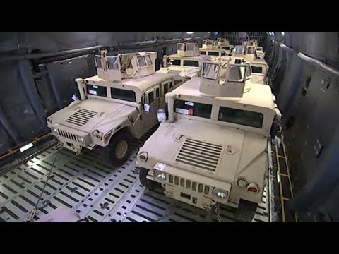 poroshenko gets military humvees from us takes a spin